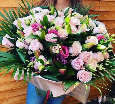 Luxury rose lily and lizzianthus handtied