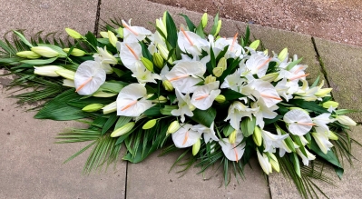 lily and anthurium casket spray
