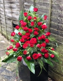 Red rose service arrangement