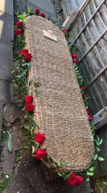 casket garland with  red roses