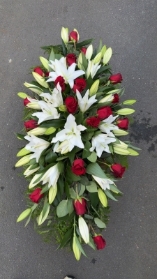 Lily and rose casket spray red and white